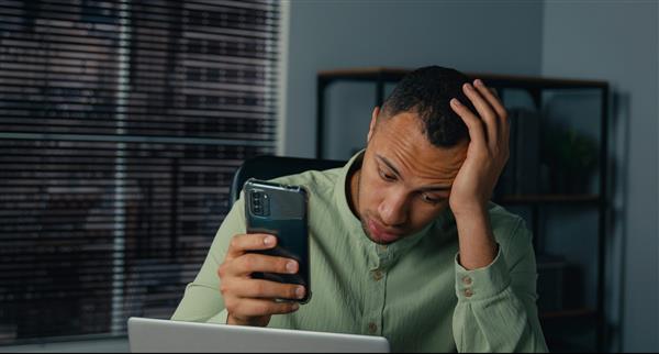 Confused, or betrayed, investor at home