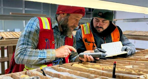 AT4 US Projects Manager Dr Mike Feinstein and Senior Geologist Jairo Trevino reviewing core from the Emma area.