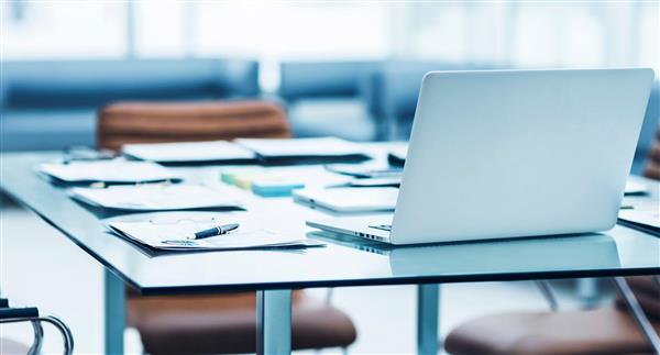 Laptop on board room table