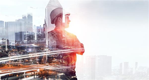 Man standing against a city scape
