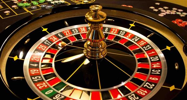 A roulette wheel with the classic black and red design.