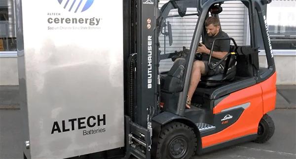 A factory worker moves a CENERGY Altech Batteries delivery.