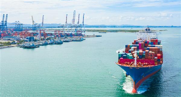 A cargo ship comes into port.