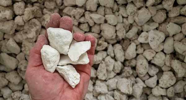 Magnesium held in a hard worker's hand